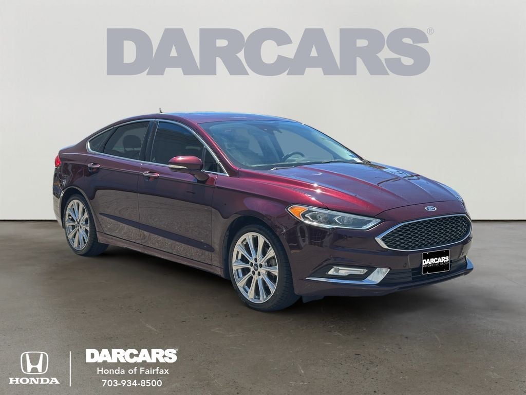 2017 Ford Fusion Platinum in Burgundy — front three-quarter view