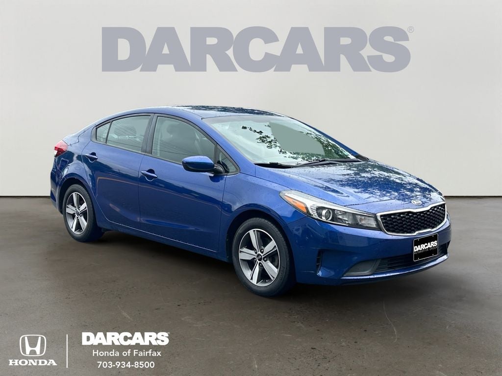 2018 Kia Forte S in Deep Sea Blue — front three-quarter view