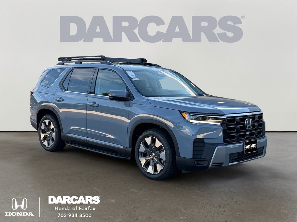 2026 Honda Pilot Elite in Sonic Gray Pearl — front three-quarter view
