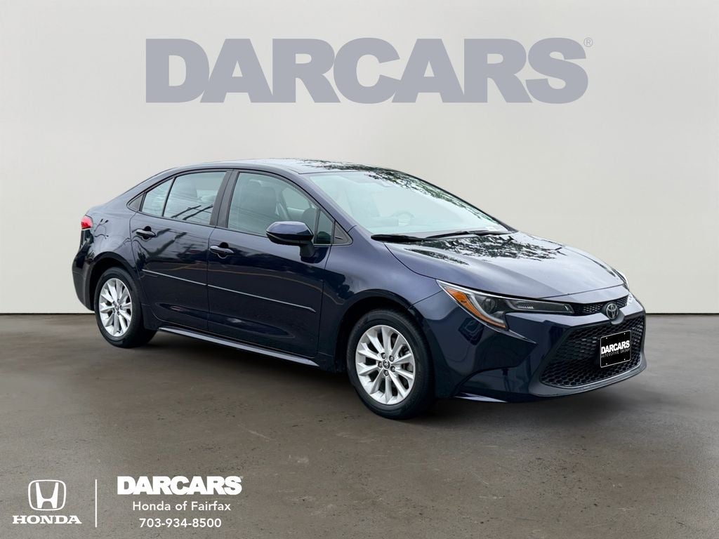 2022 Toyota Corolla LE in Blueprint — front three-quarter view