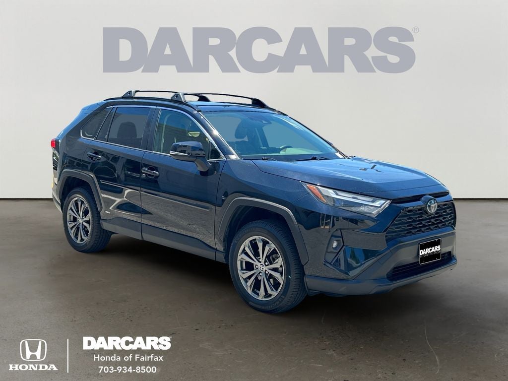 2022 Toyota RAV4 Hybrid XLE Premium in Midnight Black Metallic — front three-quarter view