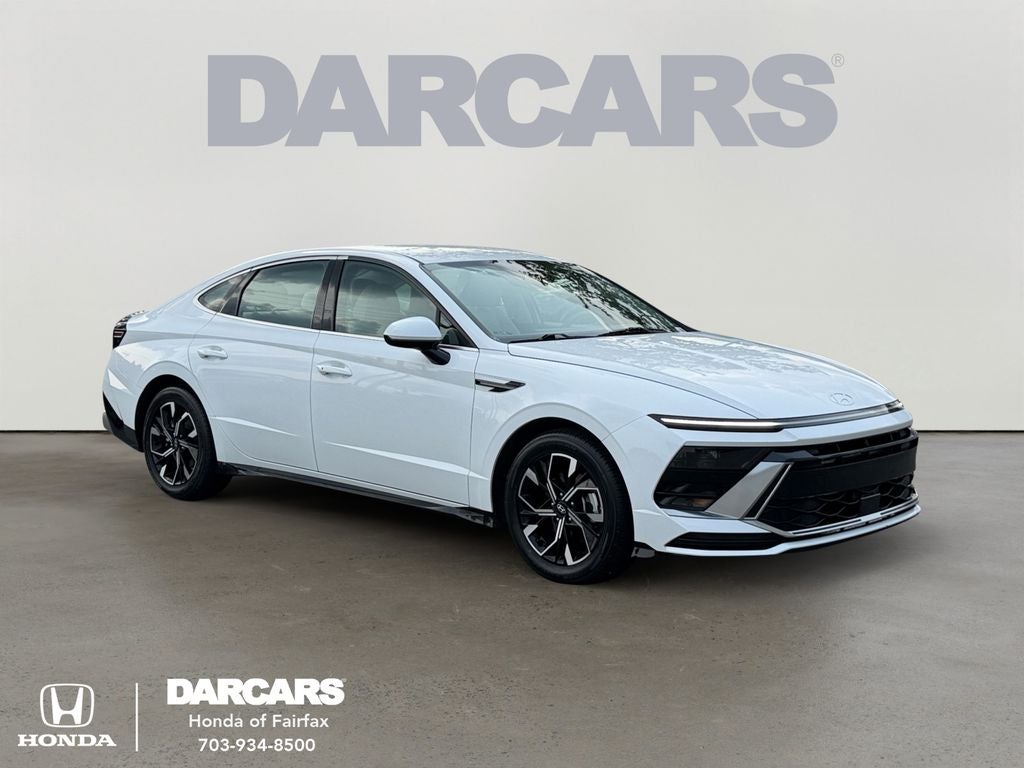 2024 Hyundai Sonata SEL in Serenity White — front three-quarter view