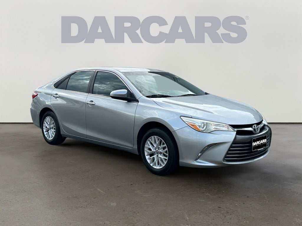 2016 Toyota Camry LE in Celestial Silver Metallic — front three-quarter view