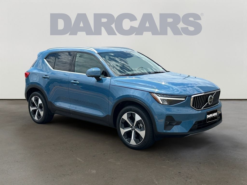 2025 Volvo XC40 B5 Plus Bright Theme Volvo Certified in Fjord Blue Metallic — front three-quarter view